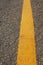 Asphalt texture with yellow stripe-Rural Road-A curved tarmac road-textured asphalt road with cracked yellow marking-asphalt road
