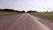 Asphalted country highway along the forest