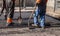 Asphalting in progress, workers in uniform