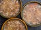 aspic meat jelle in bowls over concrete background