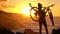 Aspirations active lifestyle MTB cyclist mountain biking woman cheering happy
