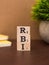 Assam, india - March 30, 2021 : Word RBI written on wooden cubes stock image.