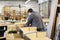 Assembler making furniture factory workshop
