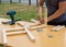 Assembling a wooden stool with an electric screwdriver