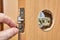 Assembly of door handle and installation lock with latch