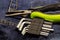 Assembly of furniture tools, hexahedral, kits and pasatizhi with a green handle