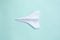 Assembly procedure of a paper white airplane. Origami. C