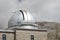 Assergi, AQ, Italy - August 20, 2020: dome with the telescope of the astronomical observatory in the mountains for the observation