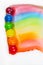 Asset of skittles in rainbow streak on white background