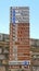 Assisi, Italy. A large number of small-scale signs showing the direction of the various monuments and main services of the city