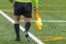 Assistant referee hold flag. closeup