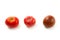 Assort of different color tomatoes isolated on white background with clipping path