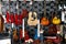 Assorted acoustic and electric guitars on display at a music store