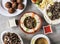 Assorted arabic food falafel, lamb shawarma platter, lentil soup, lamb hummus laham, beef fattoush bil laham served in dish