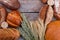 Assorted artisan bread and wheat ears.