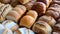 Assorted bakery products including loaves of bread and rolls