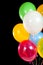 Assorted balloons on a black background