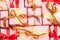 Assorted beautiful different size gifts with red gold ribbons background