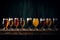 Assorted beer glasses on wooden table with rich colors and textures for brewery or pub concept