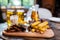 Assorted beer snacks with beer mugs