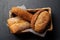 Assorted bread varieties in a basket