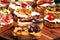 Assorted bruschetta with various toppings. Appetizing bruschetta or brie crostini. Variety of small sandwiches. Mix bruschetta on