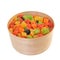Assorted candied fruits in a wooden pot on a white background