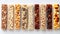 Assorted chewy granola bars displaying various flavors and ingredients in close up shot