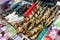 Assorted chicken and pork innards and hotdog in barbecue sticks sold as street food in the Philippines