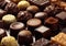 Assorted chocolate pralines, confectionery gourmet dark,white,milk chocolate candies.Macro.AI Generative