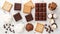 Assorted chocolates and crackers on marble, ingredients for s\\\'mores