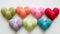 Assorted Color Knitted Heart Cushions. Knitted Heart Object