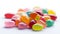 Assorted colorful candies on white background. Shallow dof.