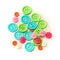 Assorted colorful craft buttons over white