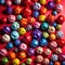 Assorted colorful crumpled paper balls, showing diverse discarded ideas