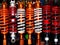 Assorted colorful motorcycle shock absorbers