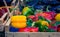 Assorted colourful peppers at a market