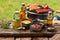 Assorted condiments and spices on a picnic table