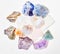 Assorted crystal healing stones on white