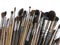 Assorted dirty old painting brushes. Isolated on