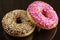 Assorted doughnuts in the glaze and colorful sprinkles