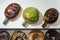 Assorted doughnuts lined on a white background