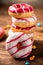 Assorted doughnuts on wooden table