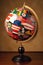 assorted flags of various countries on a globe