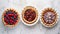 Assorted Fresh Homemade Pies on Rustic Wooden Table