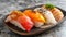 Assorted Fresh Sushi Plate on Grey Background. Close-up of Traditional Japanese Food. Nigiri Sushi Selection. Culinary