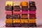 Assorted gourmet chocolate bars stacked showcasing rich variety