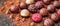 Assorted Gourmet Chocolate Pralines on Dark Background. Generative ai