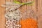 Assorted grains on wooden table.