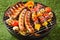 Assorted grilled meat on a summer barbecue